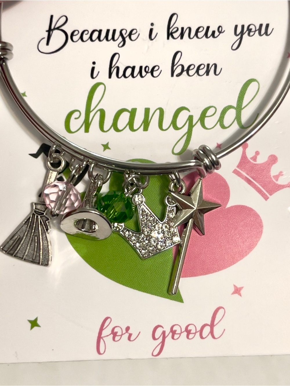 Bracelet from Wicked. Charms hat, broom